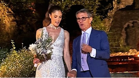 Gli abiti da sposa di Daniela Ferolla: look tradizionale per la cerimonia, paillettes alla festa