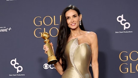 Golden globes, Demi Moore brilla in Armani privé e Saint Laurent trionfa con «Emilia Pérez»