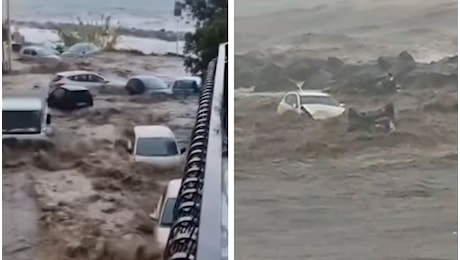 Torrente esondato a Torre Archirafi, auto trascinate via da acqua e fango: finite in mare, il video