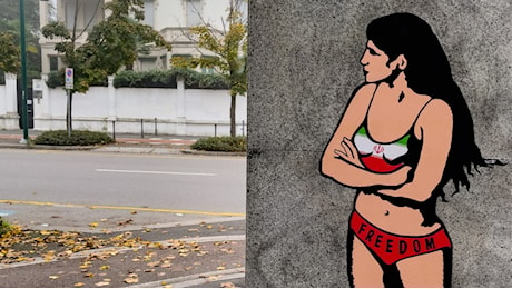 Sul muro del consolato iraniano di Milano appare l'immagine della studentessa nuda